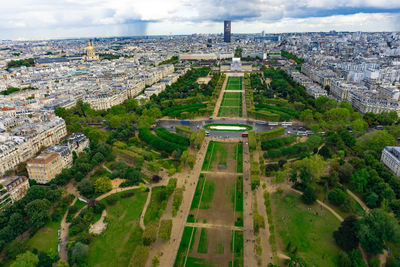 High angle view of trees and buildings in city