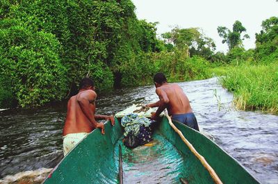 Man standing by river