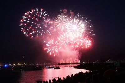 Firework display at night