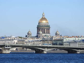 Bridge over river against clear sky