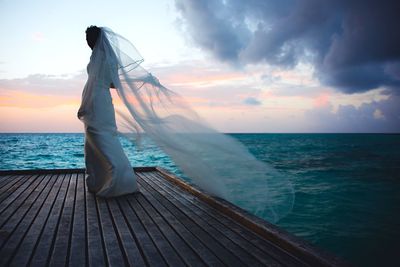 Scenic view of sea against sky during sunset