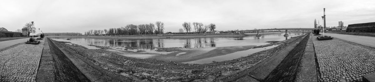 View of city against cloudy sky