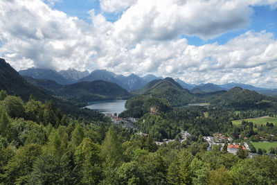 Scenic view of landscape and mountains against sky