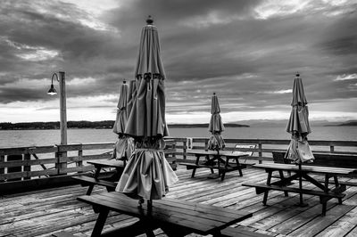 Pier on sea against sky