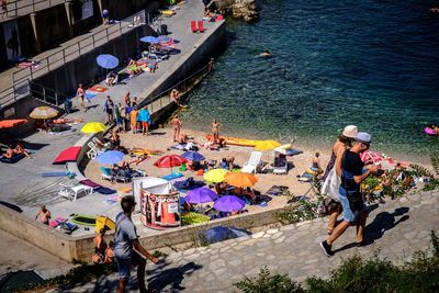 High angle view of people enjoying in water