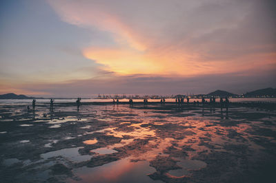 Scenic view of sea against sky at sunset