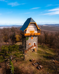 Aerial view of the famous sasberc lookout tower which is the highest point of cserhat mountain.