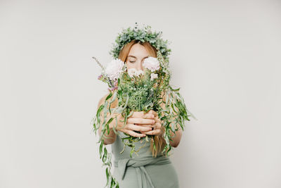 Girl holding flower bouquet