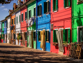 Multi colored residential buildings in city