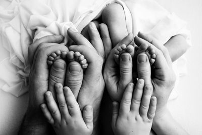 Close-up of hands and feet