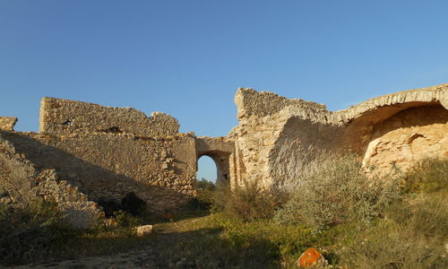 View of fort against blue sky