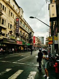 People walking on city street