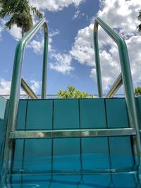 Low angle view of swimming pool against sky