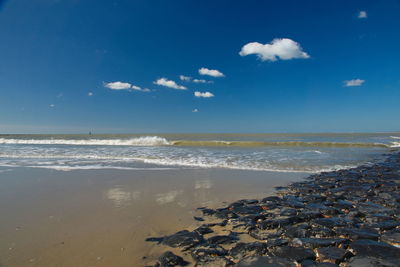 Scenic view of beach against sky