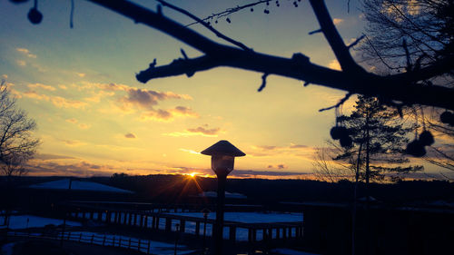 Silhouette horse against sky during sunset