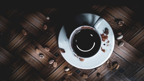 High angle view of coffee cup on table