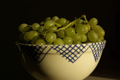 Close-up of grapes in basket