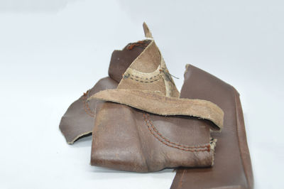 Close-up of shoes against white background