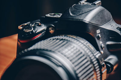 Close-up of camera on table