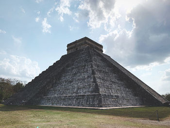 View of temple against cloudy sky