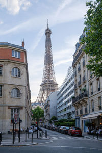 View of buildings against cloudy sky