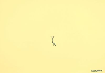Low angle view of bird flying in sky