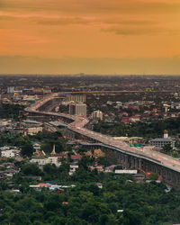 High angle view of cityscape against sky during sunset