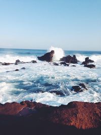 Scenic view of sea against clear sky