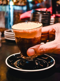 Close-up of coffee cup on table