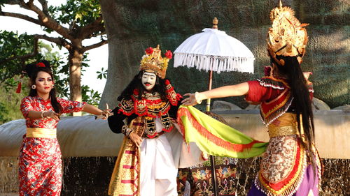 People in traditional clothing during festival