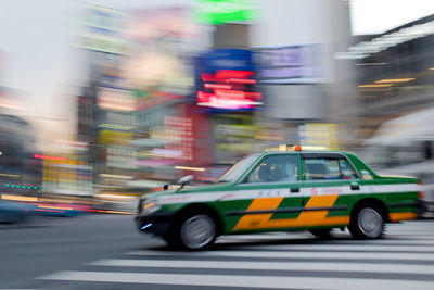 Blurred motion of car on city street