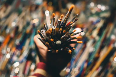 Close-up of multi colored paint brushes 
