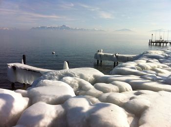 Scenic view of sea against sky during winter