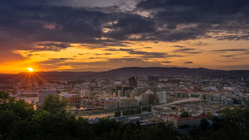 High angle view of townscape against sky at sunset