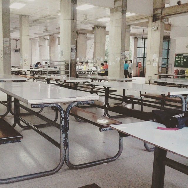 indoors, empty, absence, interior, chair, built structure, transportation, architecture, flooring, public transportation, window, day, seat, table, tiled floor, incidental people, architectural column, no people, mode of transport, railing