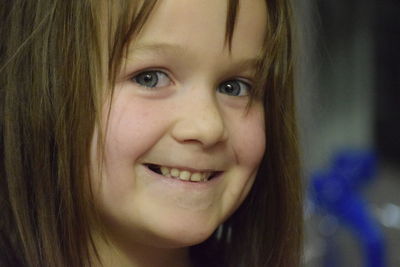 Close-up portrait of smiling girl