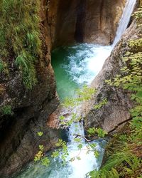 High angle view of waterfall in forest