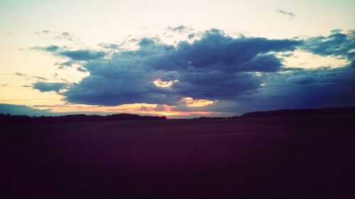 Scenic view of landscape at sunset