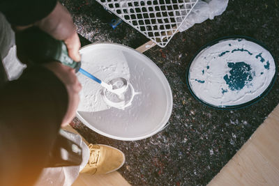 High angle view of person preparing food