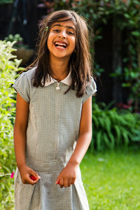 Portrait of young girl laughing