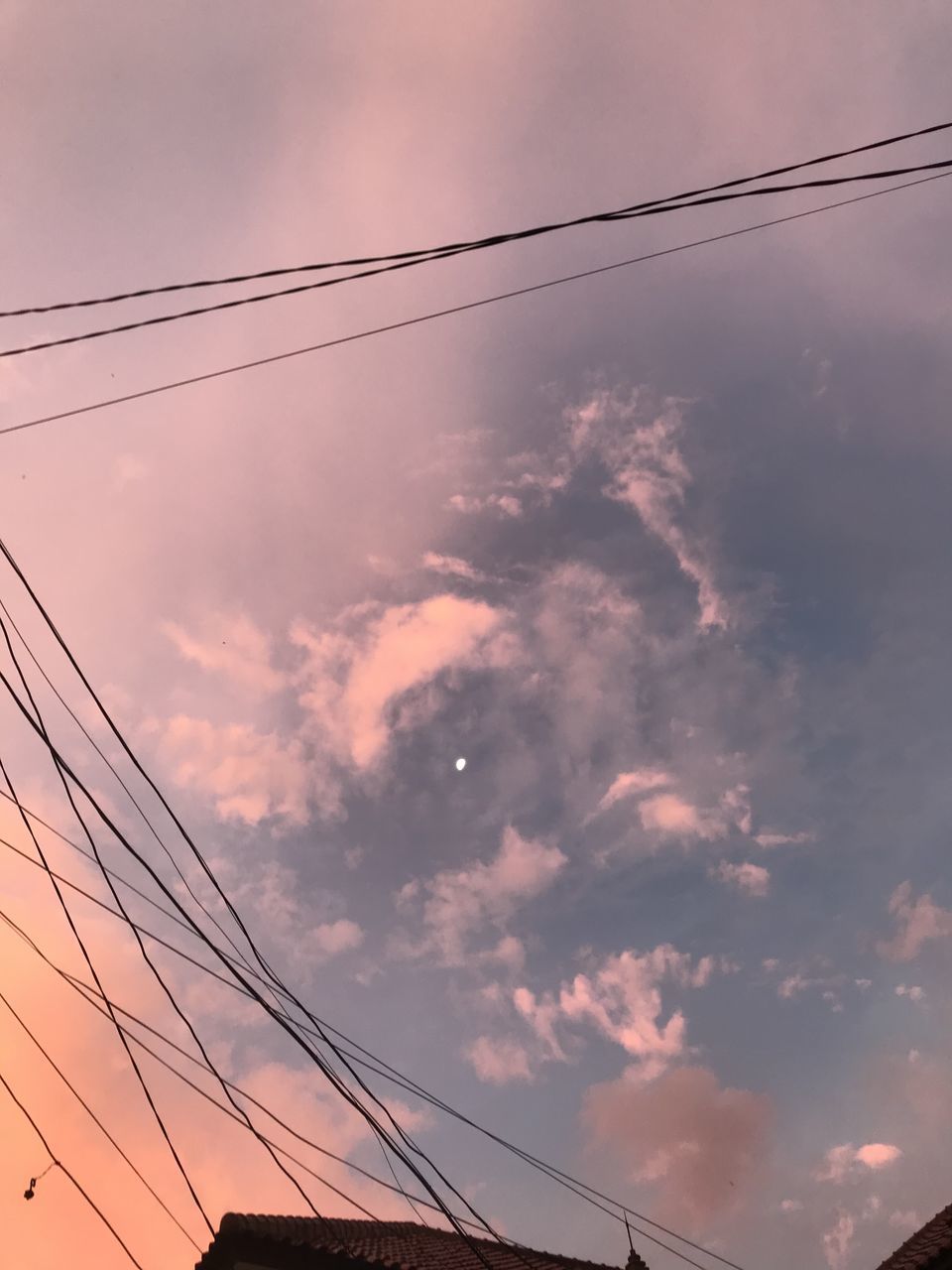 LOW ANGLE VIEW OF POWER CABLES AGAINST SKY DURING SUNSET