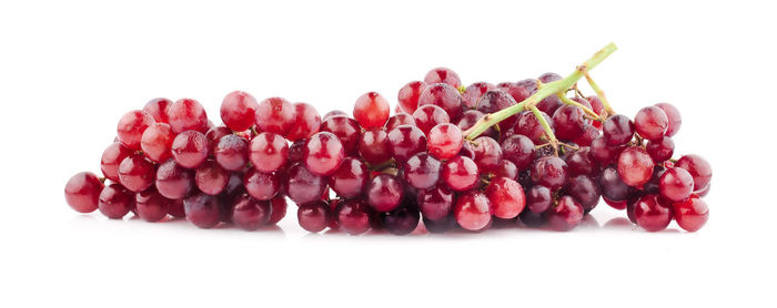 Close-up of fruits against white background