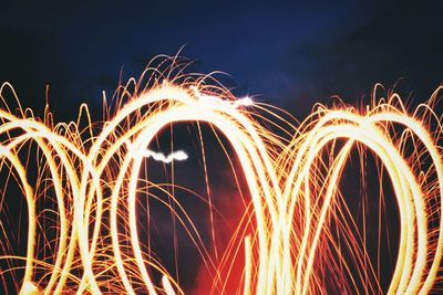 Light trails in sky at night