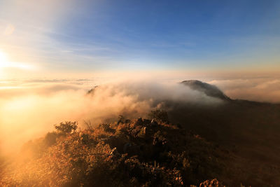 Scenic view of mountains against sky during sunset