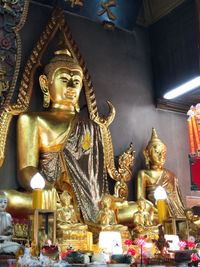 Statue in temple outside building