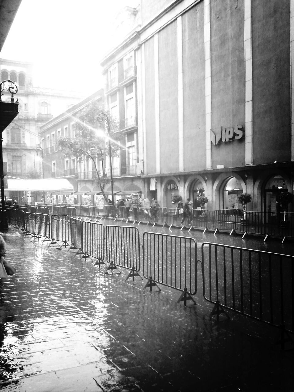 architecture, built structure, building exterior, water, reflection, city, waterfront, canal, building, transportation, window, wet, day, incidental people, in a row, railing, outdoors, no people, river, glass - material