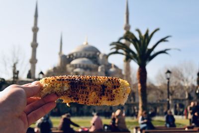 Close-up of hand holding food