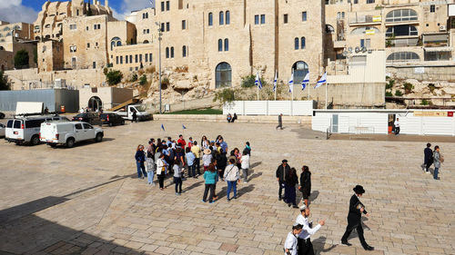 High angle view of people in town square