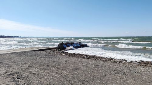 Scenic view of beach against clear sky