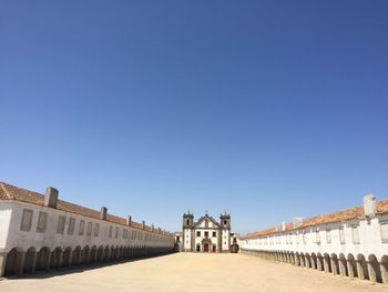 Buildings against blue sky